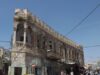 Operación israelí desplaza a unos 1,200 palestinos en Hebrón Edificio de piedra y taxi en la ciudad antigua de Hebrón; fotografía de archivo de 2015.